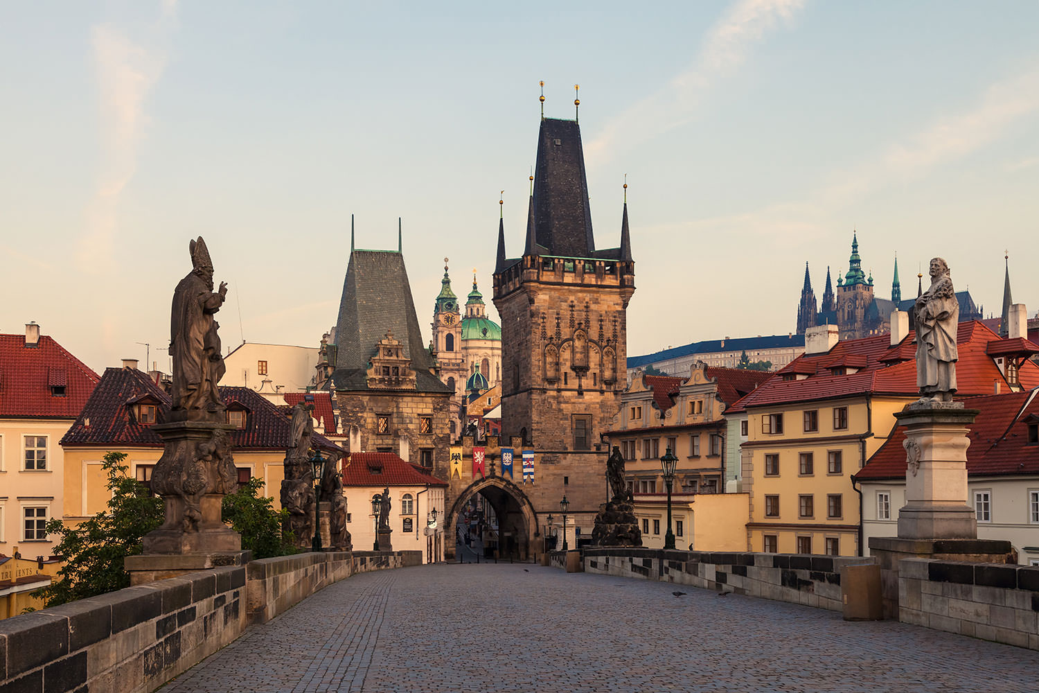 The Lesser Town Bridge Tower (Malostranská mostecká věž), Prague Castle (Pražský hrad) and Charles Bridge (Karlův most) at Sunrise, Prague, Czechia